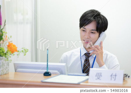 Medical receptionist man Medical receptionist man 54981016