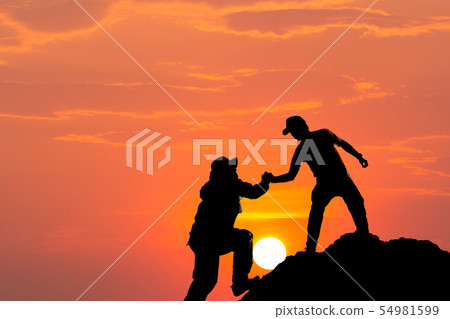 Silhouette of man hold up hands on the peak of Silhouette of man hold up hands on the peak of 54981599