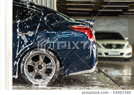 Cleaning the car (Car detailing) at car care shop 54983380