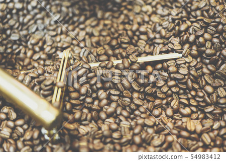 Coffee beans in roaster coffee beans machine Coffee beans in roaster coffee beans machine 54983412
