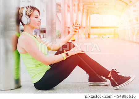 sport women relax enjoy listening music happy 54983616