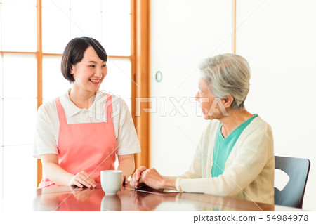 Nursing care senior female helper caregiver Nursing care senior female helper caregiver 54984978