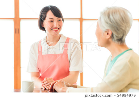 Nursing care senior female helper caregiver Nursing care senior female helper caregiver 54984979