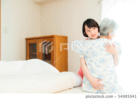 Nursing care senior female helper caregiver 54985041