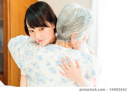 Nursing care senior female helper caregiver 54985042