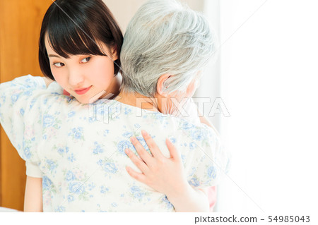 Nursing care senior female helper caregiver 54985043