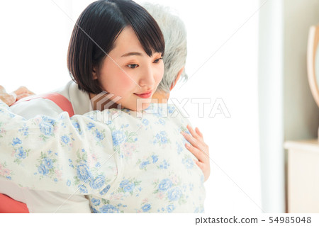 Nursing care senior female helper caregiver 54985048