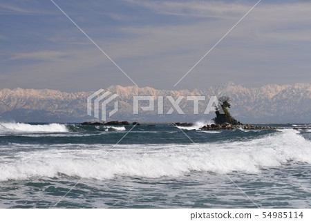 Amaharashi coast overlooking the Tateyama mountain range in the distance Amaharashi coast overlooking the Tateyama mountain range in the distance 54985114