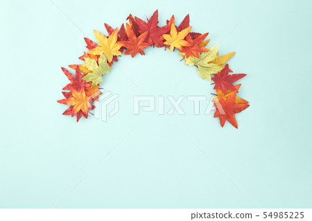 autumn leaves decorative on pale blue 54985225