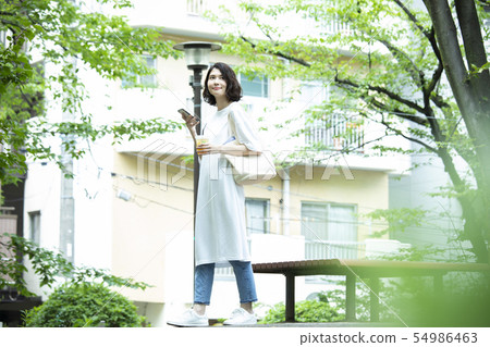 A young woman walking A young woman walking 54986463