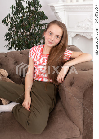 Portrait of a beautiful redhead teen girl. Cute 54988057