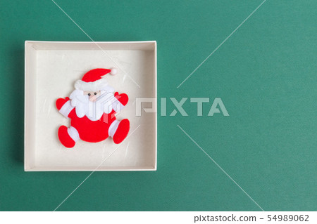 Small Santa Claus in a Christmas Day Gift Box Small Santa Claus in a Christmas Day Gift Box 54989062