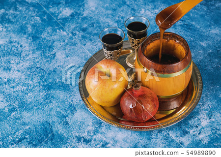 Honey, apple and pomegranate for traditional 54989890