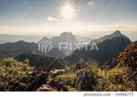 Sunshine over mountain range in wildlife sanctuary Sunshine over mountain range in wildlife sanctuary 54998777