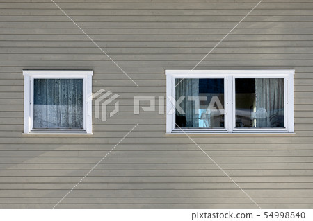 Gray hardwood wall with windows Gray hardwood wall with windows 54998840