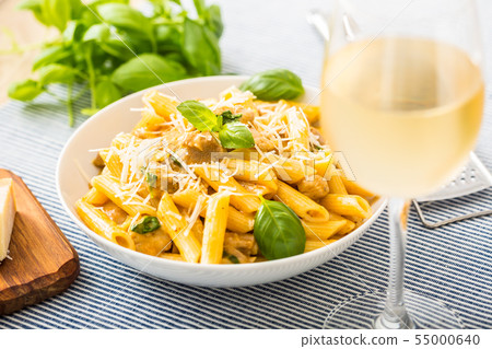 Pasta penne with chicken pieces mushrooms basil Pasta penne with chicken pieces mushrooms basil 55000640