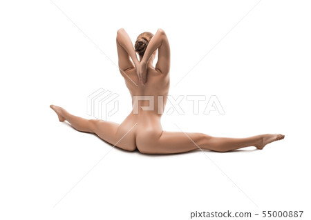 Woman in the nude sitting in a split isolated view 55000887