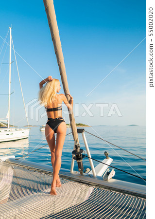 beautiful sexy woman in swimwear relaxing on a Stock Photo