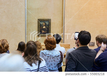 Visitors take photo of Leonardo DaVinci's Mona Lisa at the Louvre Museum Visitors take photo of Leonardo DaVinci's Mona Lisa at the Louvre Museum 55003218