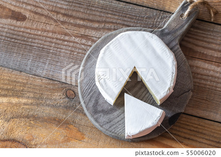 Camembert cheese on the wooden board 55006020