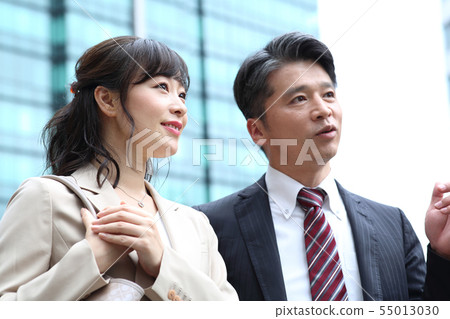 Businessman man and woman middle 55013030