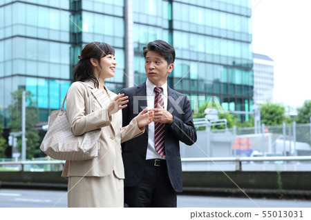 Businessman man and woman middle 55013031