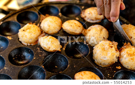 "Kanom Krok" is Thai traditional dessert.  55014253