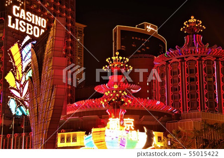 A lighted up luxury casino hotel in Macao [China, Macao] 55015422