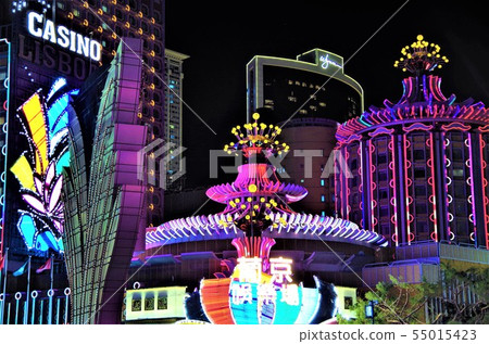 A lighted up luxury casino hotel in Macao [China, Macao] 55015423