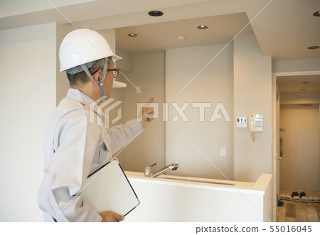 Businessman in helmet housing renovation general purpose 55016045