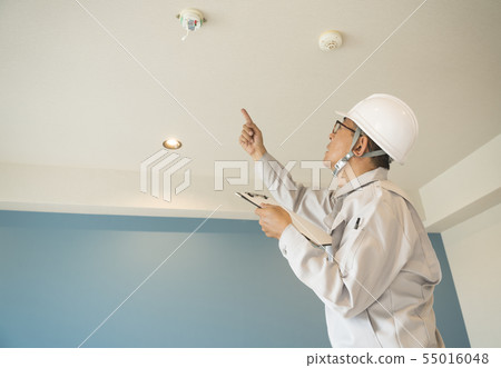 Businessman in helmet housing renovation general purpose 55016048