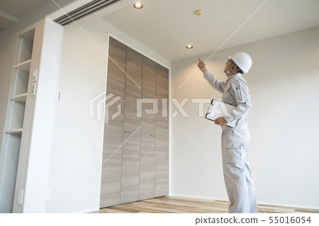 Businessman in helmet housing renovation general purpose 55016054