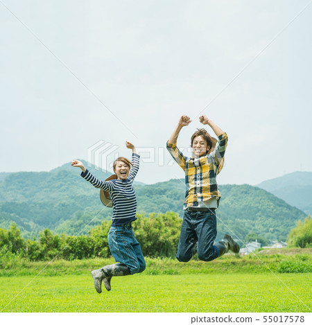 Cheerful young couple on farm 55017578