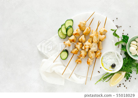 Grilled chicken kebab on skewers and traditional 55018029