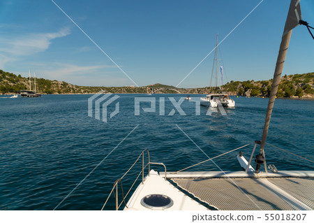 Catamaran sailing at sea in Croatia, Europe 55018207