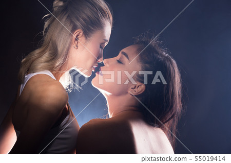 Two beautiful Asian sexy lesbian women hair touch 55019414