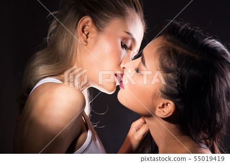 Two beautiful Asian sexy lesbian women hair touch Two beautiful Asian sexy lesbian women hair touch 55019419