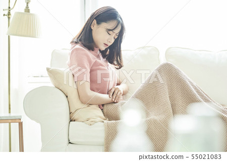 Woman poor health 55021083