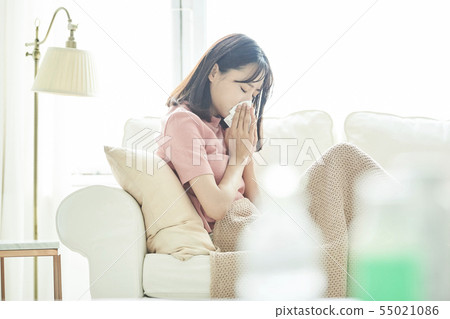 Woman poor health 55021086