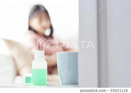 Woman poor health 55021126