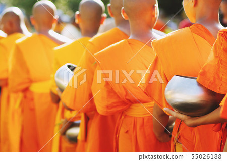 More monks with hand holding give alms bowl More monks with hand holding give alms bowl 55026188