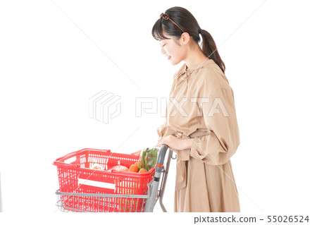 Young woman shopping for groceries at the supermarket Young woman shopping for groceries at the supermarket 55026524