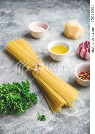 Raw ingredients for linguine with olive oil and 55026593