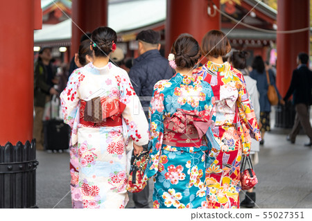Young girl wearing Japanese kimono standing in 55027351