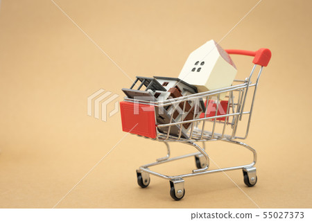 A model house model is placed on a Shopping Cart A model house model is placed on a Shopping Cart 55027373