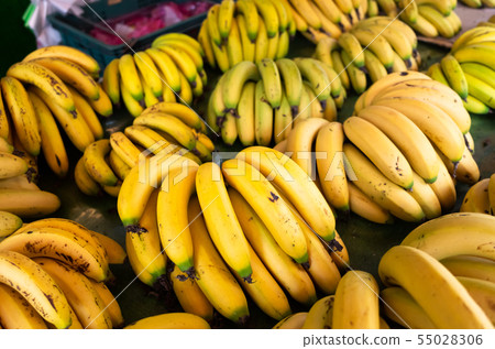 banana fruit stacked on the marketplace 55028306