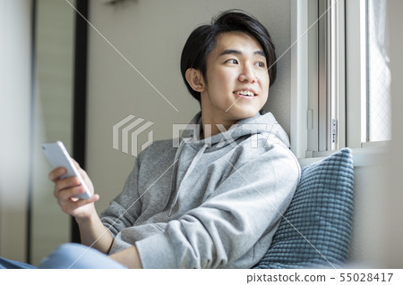 Young man smartphone Young man smartphone 55028417
