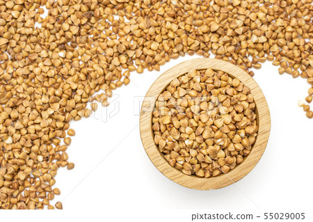 Raw buckwheat grain isolated on white Raw buckwheat grain isolated on white 55029005