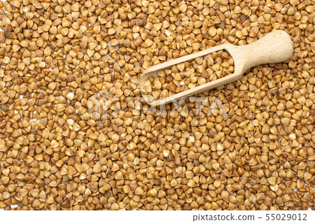 Raw buckwheat grain isolated Raw buckwheat grain isolated 55029012