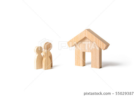 Wooden house and family. Buying a new home. Wooden house and family. Buying a new home. 55029387